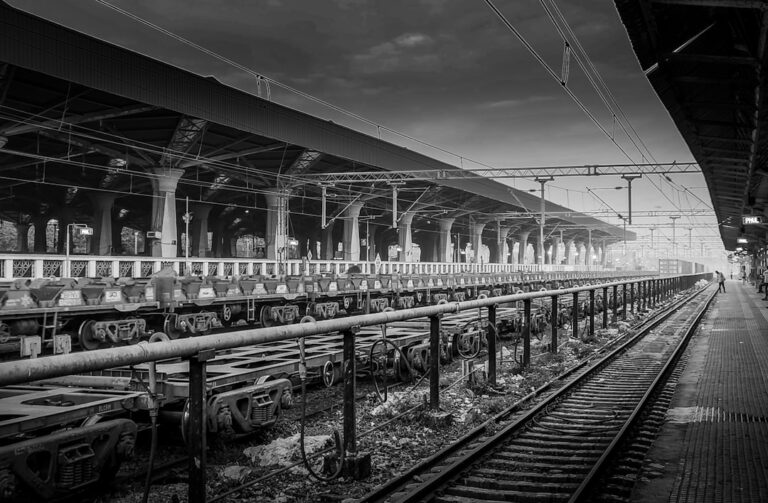Indian railway tracks and train representing RRB JE Recruitment 2026
